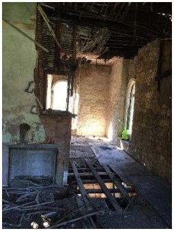 Before: water damaged and deteriorated overall condition of the ground floor interior